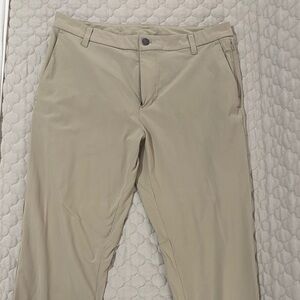 Tan Chinos with Flat Front Design and Lightweight Fabric